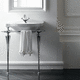 lavabo consolle / in porcellana / con piano integrato / con portasalviette integrato