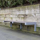 panca per spazi pubblici contemporanea / in alluminio / in plastica riciclata / a muro