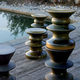 sgabello contemporaneo / in ceramica / con base centrale / contract