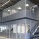 sistema room-in-room modulabile / con vano contenitore / in legno / in metallo