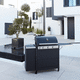 barbecue a gas / con rotelle / in metallo / con contenitore