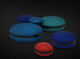 pouf contemporaneo / in tessuto / tondo / contract