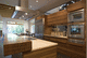 cucina contemporanea / in acciaio inox / in legno massiccio / in legno