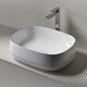 lavabo da appoggio / in ceramica / ovale / senza foro
