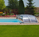 copertura per piscina bassa / telescopica / in plastica / con azionamento manuale