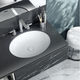 lavabo integrato / in pietra calcarea / in resina / ovale