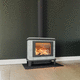 stufa a legna / 4 kW / con piedi / contemporanea
