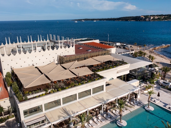 KE il design essenziale e la progettazione custom per terrazza branché di Zuma Cannes